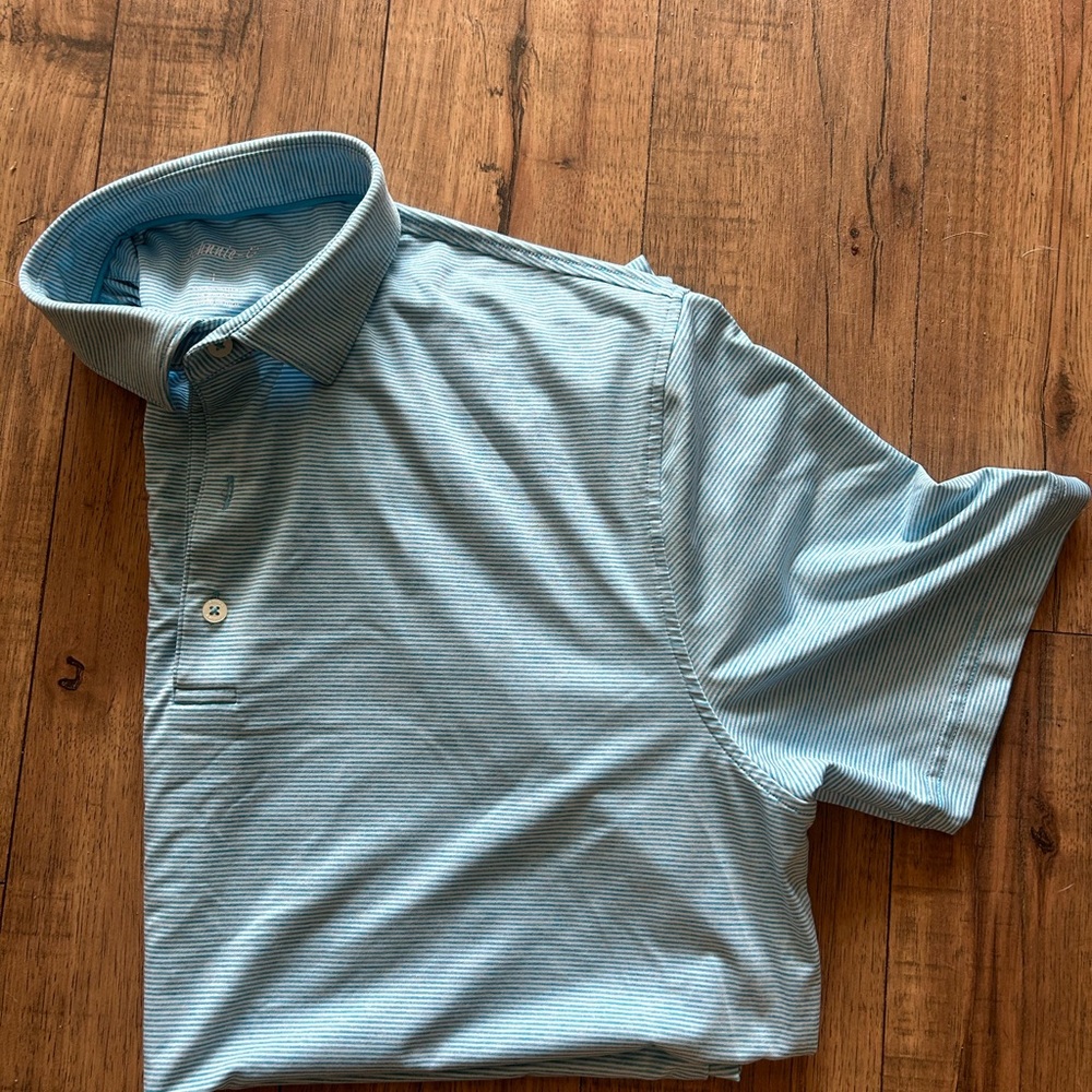 (1) Men’s Johnnie-O performance polo worn once.  Like new condition.